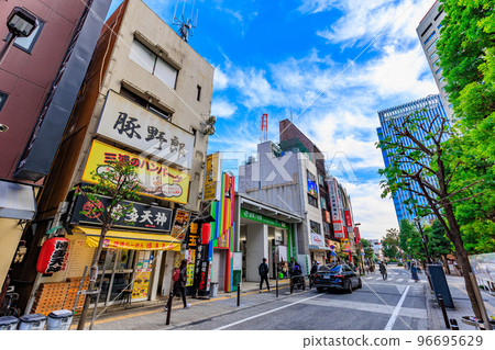 Tokyo's Chiyoda Ward, Kanda Surugadai's urban landscape, a shopping street along Meikei Dori Tokyo's Chiyoda Ward, Kanda Surugadai's urban landscape, a shopping street along Meikei Dori 96695629