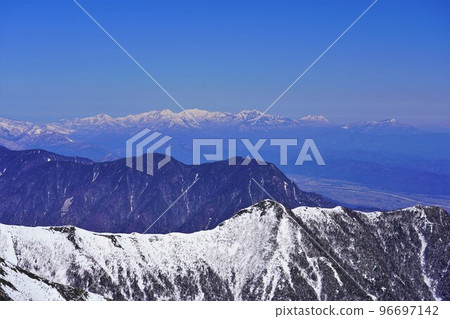 Kubiki Massif and Hokushin Gogaku from the summit of Jonendake in winter 96697142