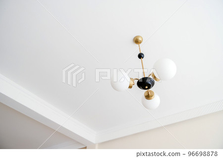 Modern chandelier decoration in white living room 96698878