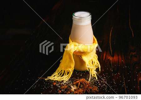 Milkshake with honey in a small bottle Milkshake with honey in a small bottle 96701093
