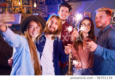 Selfie Time.Young Group of Friends Partying In A Nightclub And Toasting Drinks. Happy Young People. Selfie Time.Young Group of Friends Partying In A Nightclub And Toasting Drinks. Happy Young People. 96701139