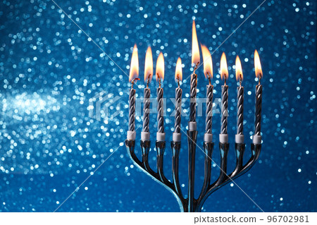 Jewish holiday Hanukkah background with menorah -traditional candelabra and candles 96702981