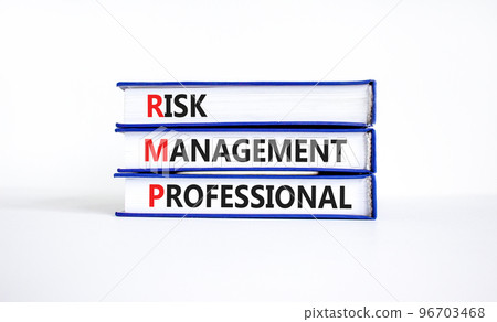 RMP risk management professional symbol. Concept words RMP risk management professional on books on a beautiful white background. Business RMP risk management professional concept. Copy space. 96703468