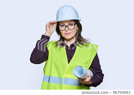 Woman engineer architect in helmet protective vest on white background Woman engineer architect in helmet protective vest on white background 96704661