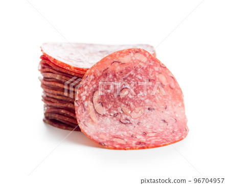 Sliced mexican salami with beans isolated on white background. Sliced mexican salami with beans isolated on white background. 96704957