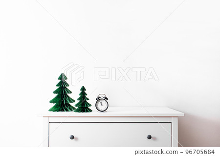 Trendy decorative Christmas trees, which made of paper with blurred house background, watch 12 clock, DIY project, Organic Modern Design, Hanging Festive Honeycomb Foldable 3D tree Trendy decorative Christmas trees, which made of paper with blurred house background, watch 12 clock, DIY project, Organic Modern Design, Hanging Festive Honeycomb Foldable 3D tree 96705684
