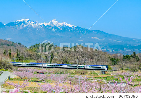 Chuo Main Line Shinpu Togenkyo ~Limited Express Azusa galloping against the backdrop of the remaining snow of Yatsugatake~ 96708369