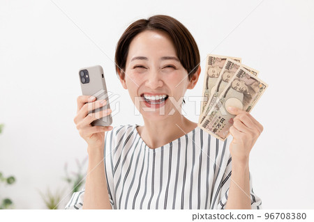 Smartphone money woman 96708380