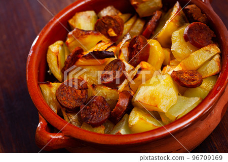 Baked potato with chorizo Baked potato with chorizo 96709169