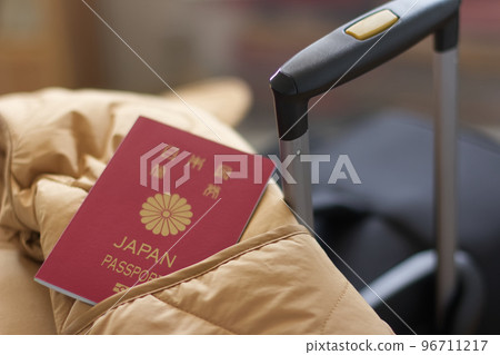 Suitcase and passport 96711217