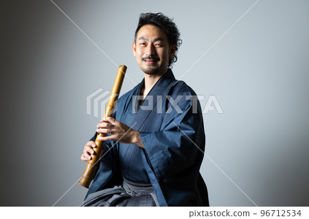 Bearded man's Japanese musical instrument series Shakuhachi 96712534