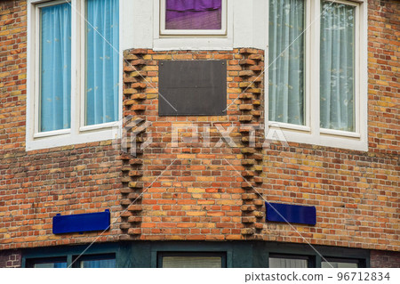 View of street near building with beauty of vegetation outside View of street near building with beauty of vegetation outside 96712834