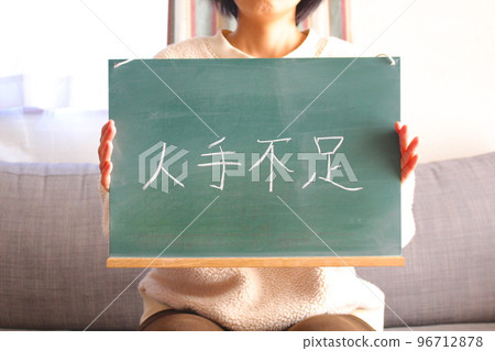 Understaffed blackboard and women 96712878