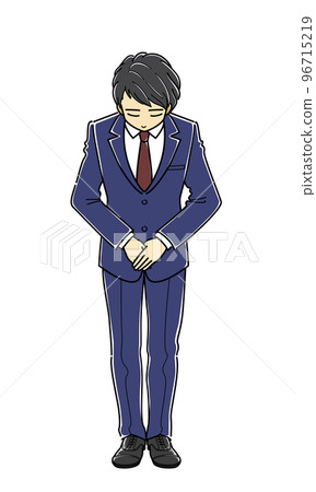 A young man in a suit who folds his hands and bows (whole body) 96715219