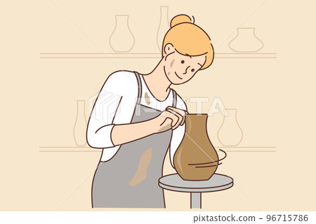 Smiling woman do clay vase at workshop 96715786