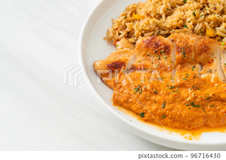 grilled chicken steak with red curry sauce and rice grilled chicken steak with red curry sauce and rice 96716430