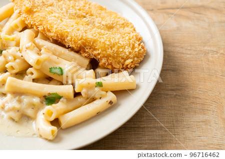 quadrotto penne pasta white cream sauce with fried fish 96716462