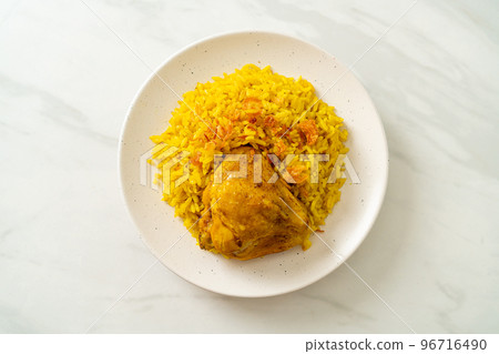 Chicken Biryani or Curried rice and chicken - Thai-Muslim version of Indian biryani, with fragrant yellow rice and chicken 96716490