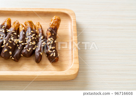 banana chocolate coating or banana dipped chocolate 96716608