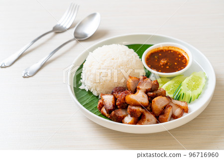 fried belly pork with rice with spicy sauce 96716960