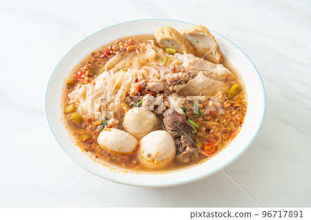 noodles with pork and meatballs in spicy soup noodles with pork and meatballs in spicy soup 96717891