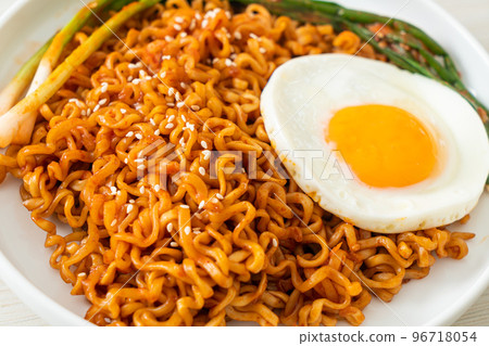 dried Korean spicy instant noodles with fried egg 96718054