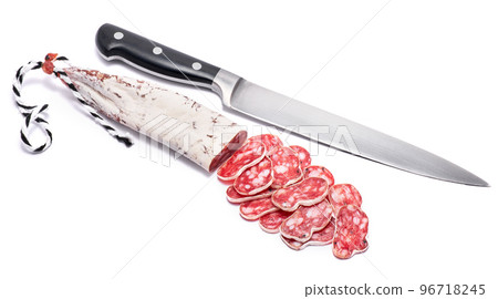 Spanish Fuet thin dried salami sausage isolated on a white background Spanish Fuet thin dried salami sausage isolated on a white background 96718245