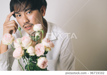 man with rose flower 96719102