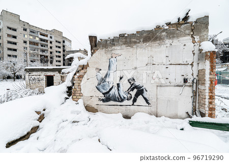 Wall of a destroyed building with Banksy graffiti in Borodyanka, Ukraine Wall of a destroyed building with Banksy graffiti in Borodyanka, Ukraine 96719290