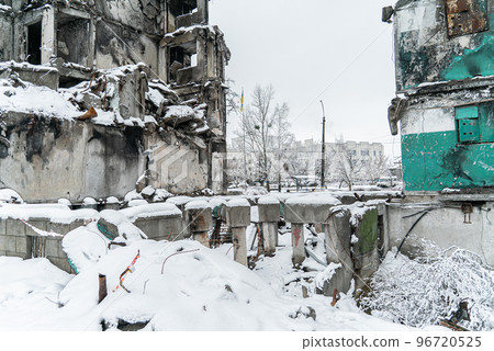 Graffiti by Banksy Gymnast Girl on the wall of a war-torn house in Borodyanka, Ukraine 96720525