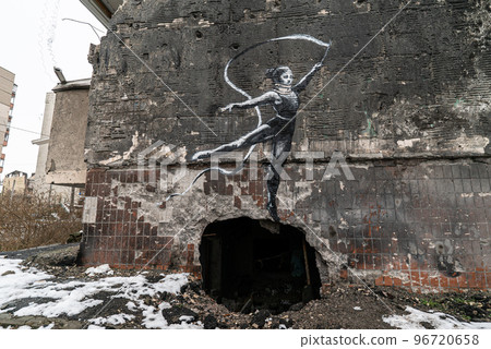 Graffiti by Banksy on a destroyed house in Irpin, Ukraine Graffiti by Banksy on a destroyed house in Irpin, Ukraine 96720658