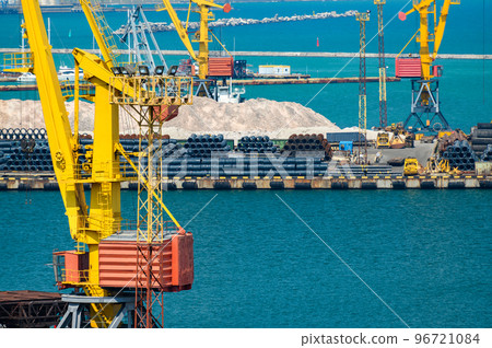 industrial seaport infrastructure - sea, cranes and minerals, metal and bundles of wire, concept of maritime cargo transportation industrial seaport infrastructure - sea, cranes and minerals, metal and bundles of wire, concept of maritime cargo transportation 96721084
