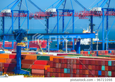 loading containers onto the ship, industrial seaport infrastructure, commercial dock and container warehouse, sea, cranes and cargo ship, concept of sea cargo transportation 96721098