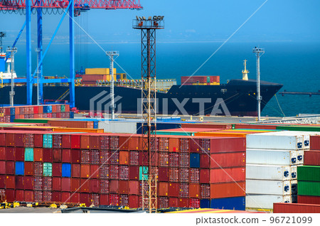 loading containers onto the ship, industrial seaport infrastructure, commercial dock and container warehouse, sea, cranes and cargo ship, concept of sea cargo transportation 96721099