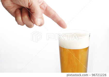 Pouring beer white background looks delicious Pouring beer white background looks delicious 96721226