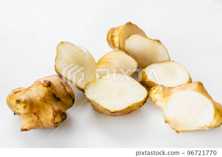 Sliced Jerusalem artichoke on white background 96721770