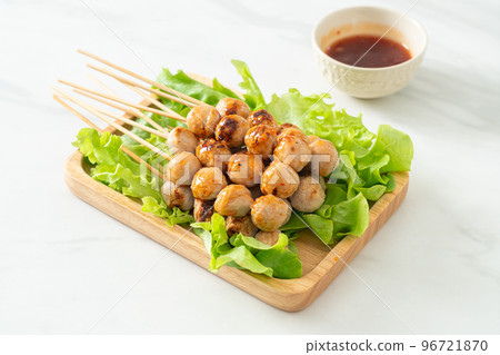 grilled meatballs skewer with spicy sauce grilled meatballs skewer with spicy sauce 96721870