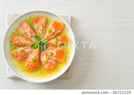 Spicy Salmon in Seafood Salad Sauce 96722539