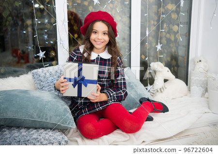 Believe in Santa Claus. Little child got xmas present. Happy child celebrate Christmas and new year. Small child enjoy boxing day. Festive season. Merry xmas. Happy New Year 96722604