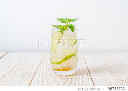 iced honey and lime soda with mint iced honey and lime soda with mint 96722712