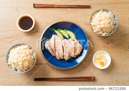 Hainanese chicken rice or rice steamed with chicken soup Hainanese chicken rice or rice steamed with chicken soup 96722886