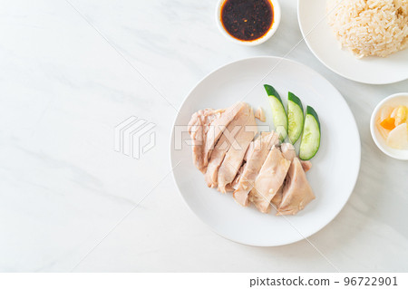 Hainanese chicken rice or rice steamed with chicken soup Hainanese chicken rice or rice steamed with chicken soup 96722901