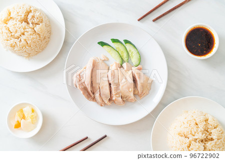 Hainanese chicken rice or rice steamed with chicken soup Hainanese chicken rice or rice steamed with chicken soup 96722902