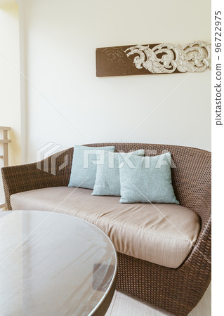 pillow decoration on patio chair on balcony 96722975