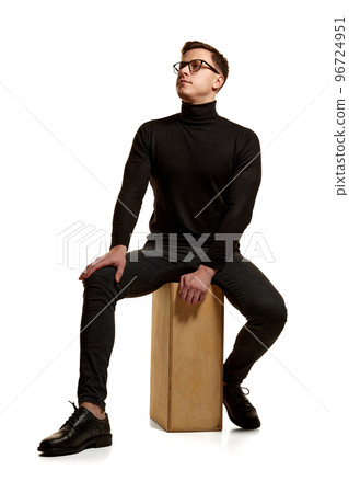 Portrait of stylish handsome businessman in total black outfit posing isolated on white background. Concept of beauty, fashion, style and business Portrait of stylish handsome businessman in total black outfit posing isolated on white background. Concept of beauty, fashion, style and business 96724951