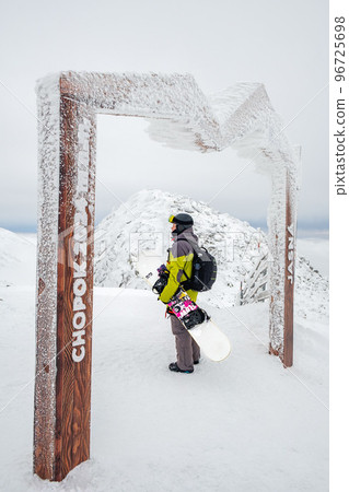Slovakia, Jasna - January 31, 2022: man snowboarder on the top of the chopok mountain 96725698
