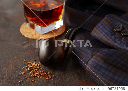 Concept of relaxation with smoking tobacco with smoking pipe and drinking alcohol 96725968