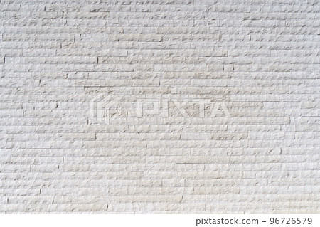 Stone decorative masonry wall background. Bricks made of natural stone surface backdrop. Design, decor, copy space 96726579