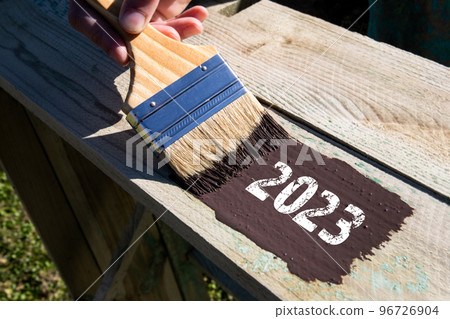 2023. Paint the wooden surface with a brush 2023. Paint the wooden surface with a brush 96726904
