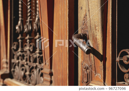 Old wooden doors in Lviv city in sunny day 96727096
